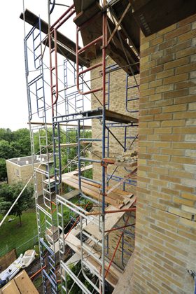 Scaffolding installed on the wall of a building